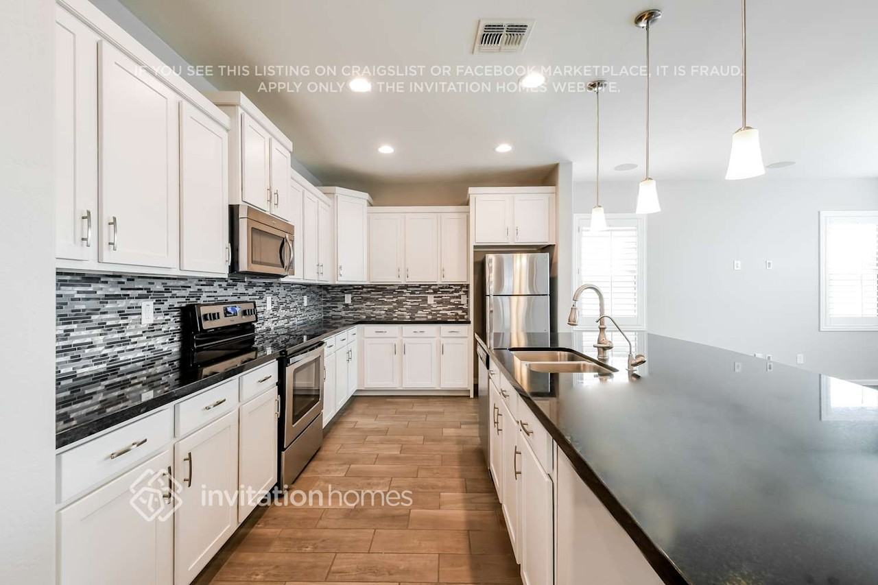 12141 W Desert Moon Way - Photo 6 of 16