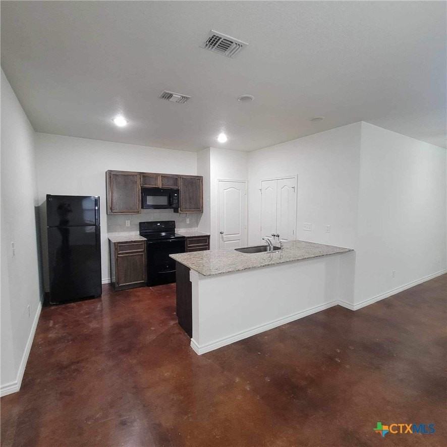 6101 Amelia Earhart Blvd #A - Photo 3 of 12