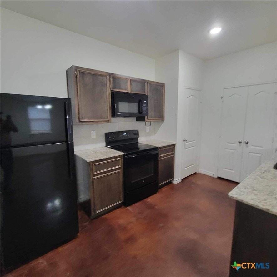 6101 Amelia Earhart Blvd #A - Photo 7 of 12