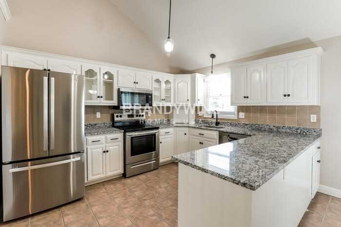 303 Amesbury Dr - Photo 7 of 24