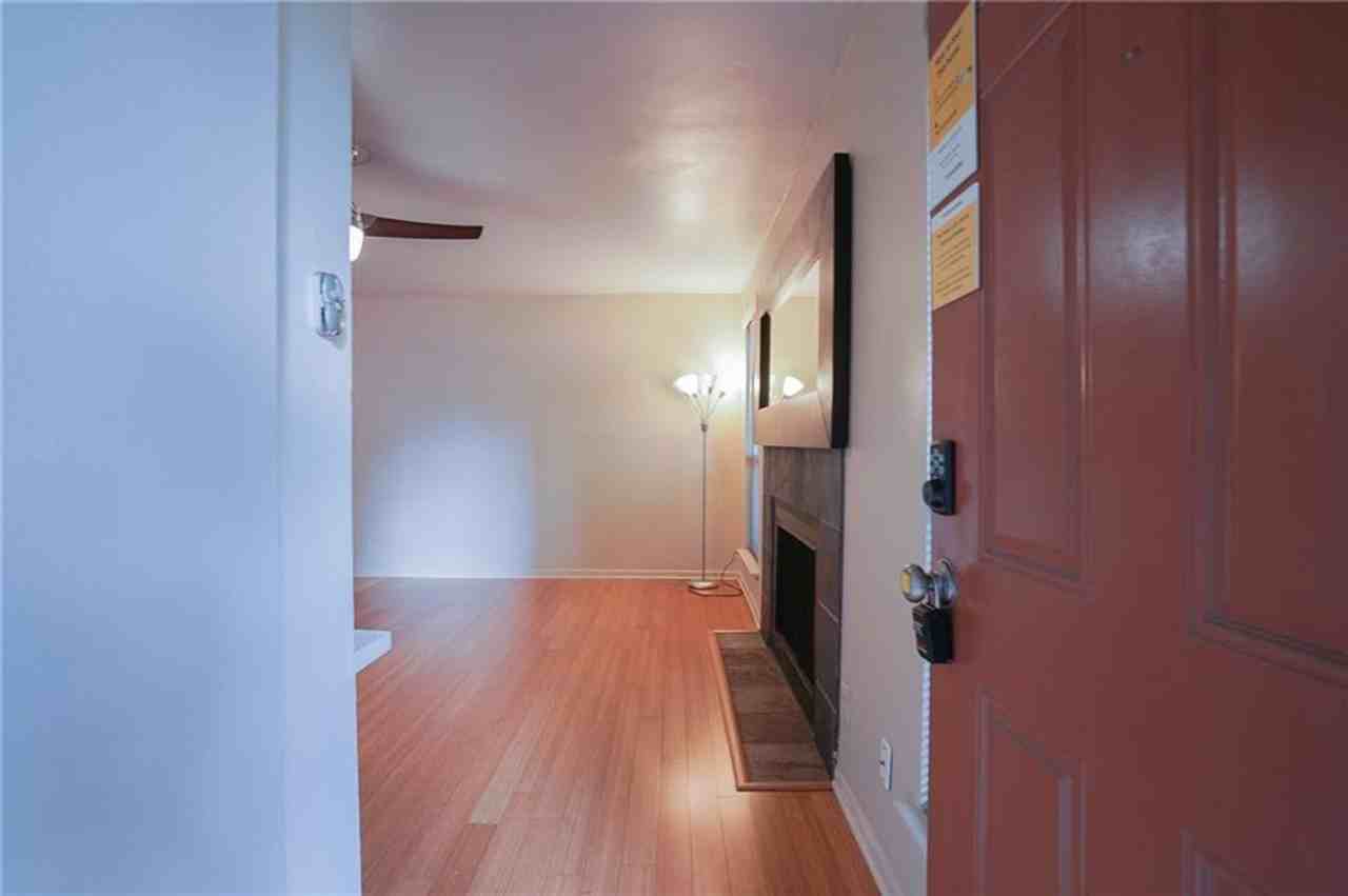 1000 W 26th St #103 - Photo 3 of 14