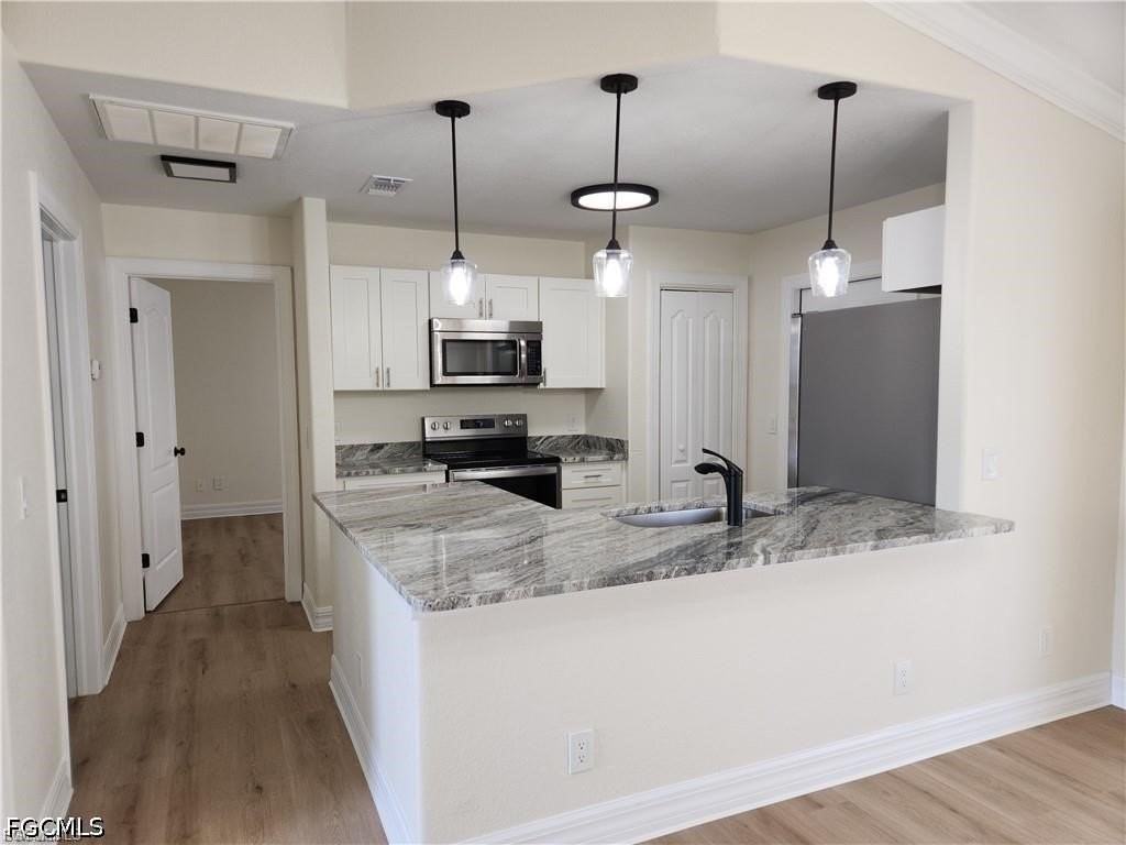 1118 Nelson Rd N - Photo 3 of 16
