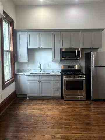 1502 S Carrollton Ave - Photo 4 of 8