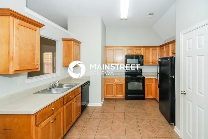9135 Tremont Dr - Photo 5 of 16