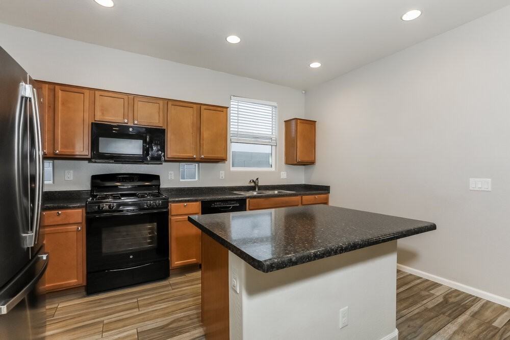 7414 E Onza Ave - Photo 6 of 16
