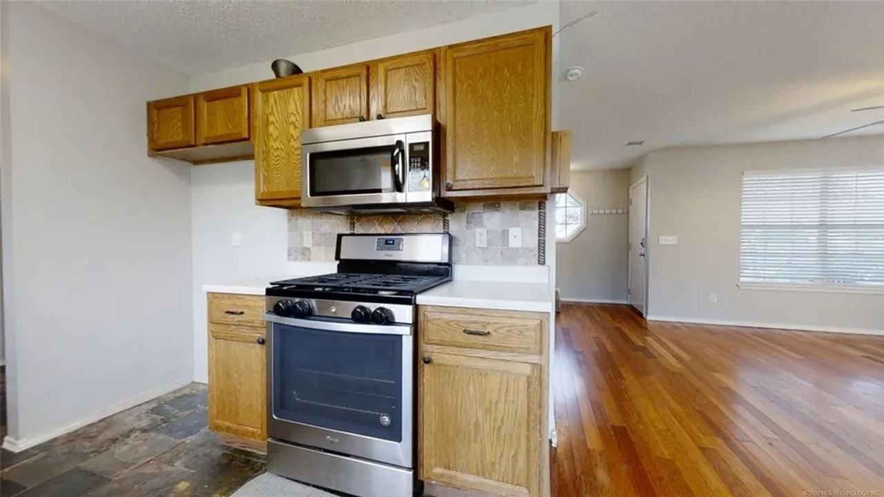 8902 N 149th East Ave - Photo 6 of 14