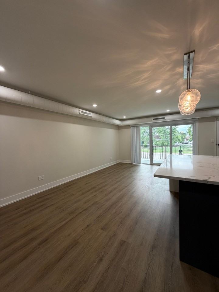 10205 Dearlove Rd #202 - Photo 4 of 20