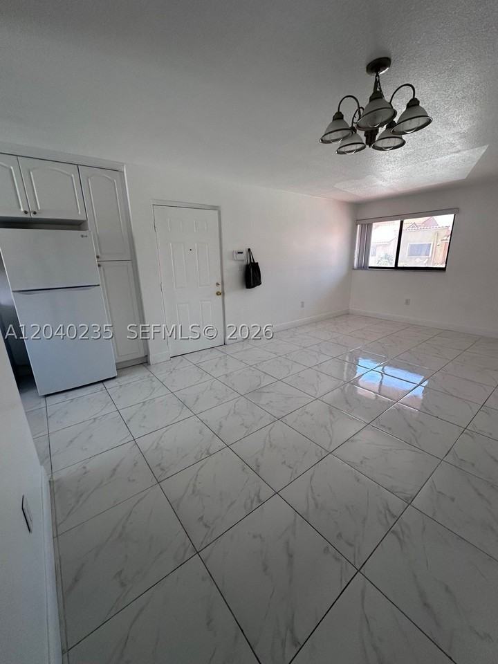 2740 W 61st St #204 - Photo 3 of 13