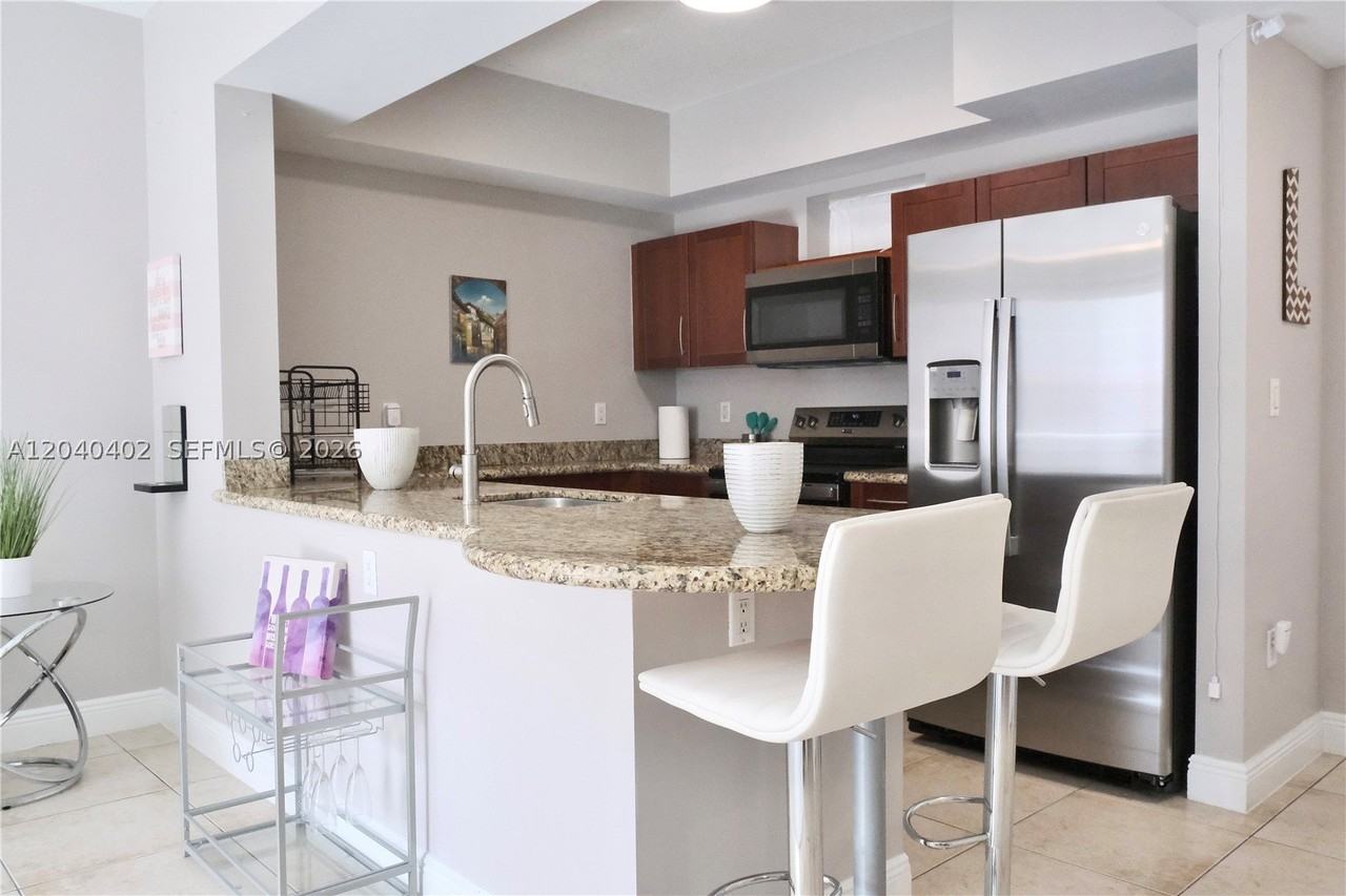 7275 Sw 90th St #C409 - Photo 3 of 45
