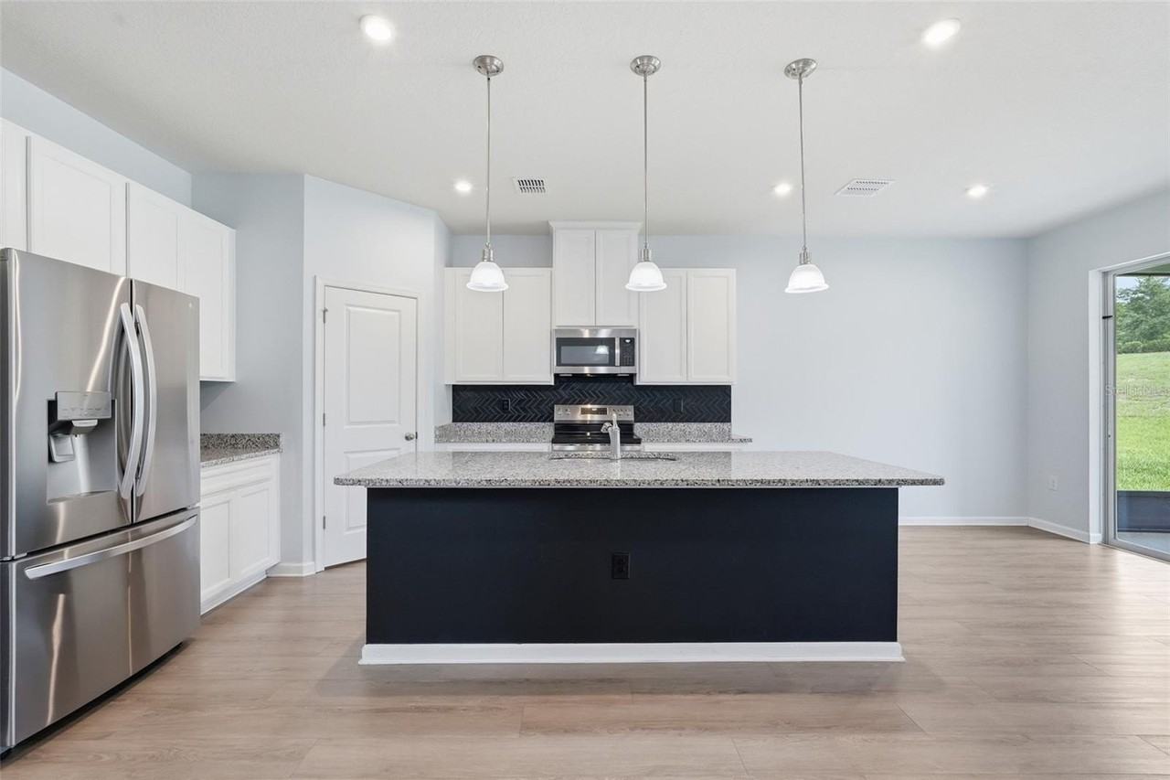 1210 Whispering Ln - Photo 3 of 50
