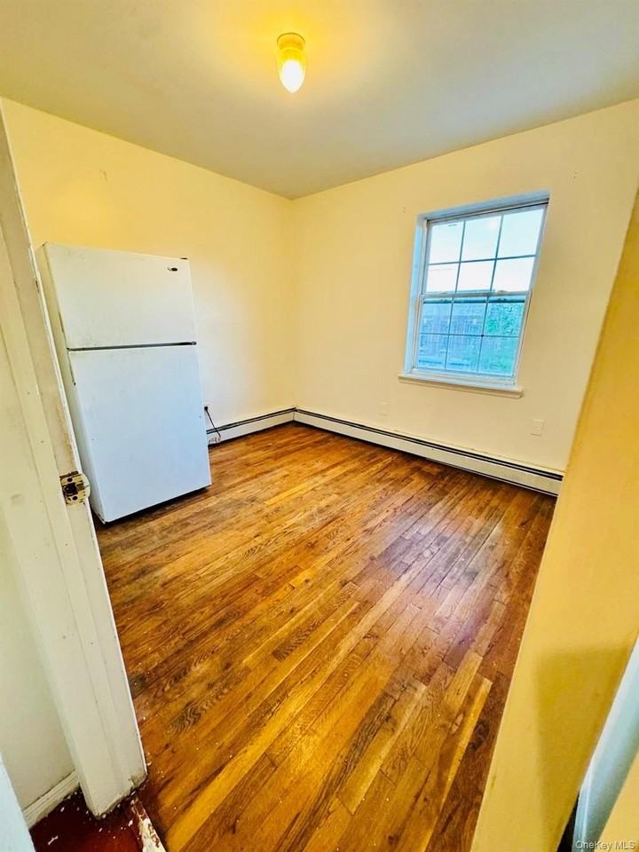 10612 156th St #3rdFL - Photo 3 of 11