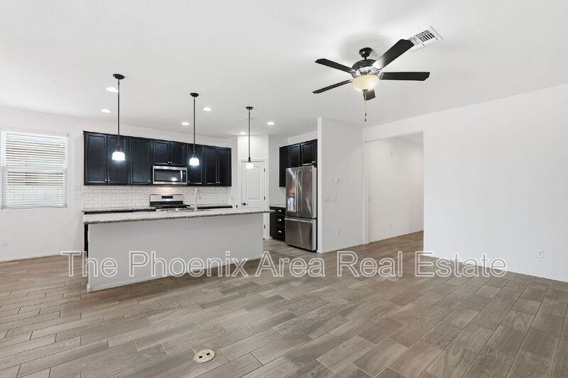 5263 W Leodra Ln - Photo 6 of 33