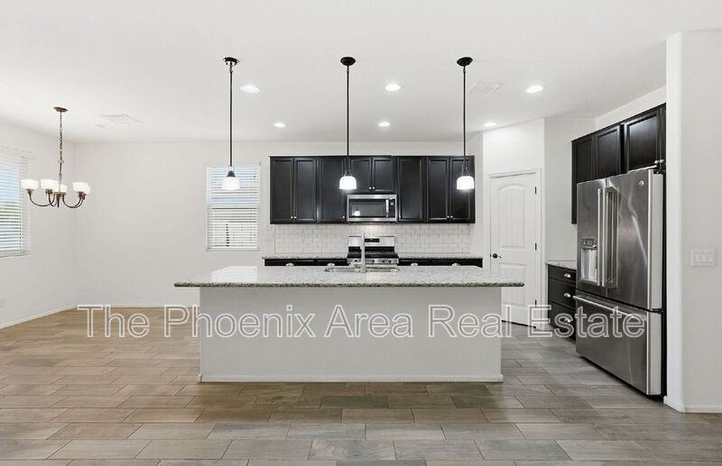 5263 W Leodra Ln - Photo 7 of 33