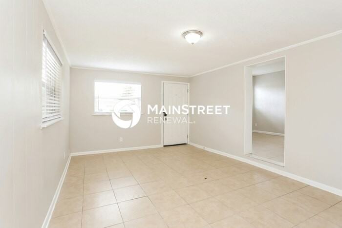 7037 Pellias Rd - Photo 3 of 16