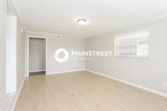 7037 Pellias Rd - Photo 4 of 16