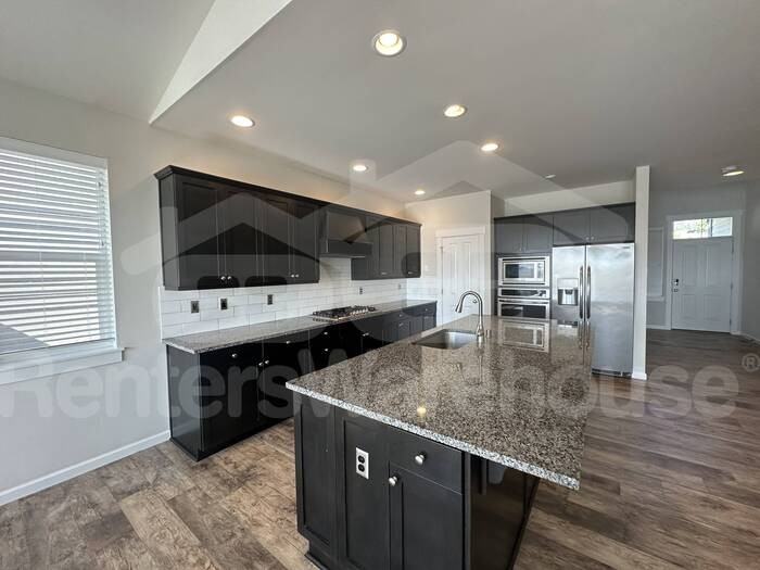 2711 Fiddleback St Ne - Photo 5 of 28