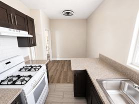 145 E 36th Pl #B - Photo 1 of 1