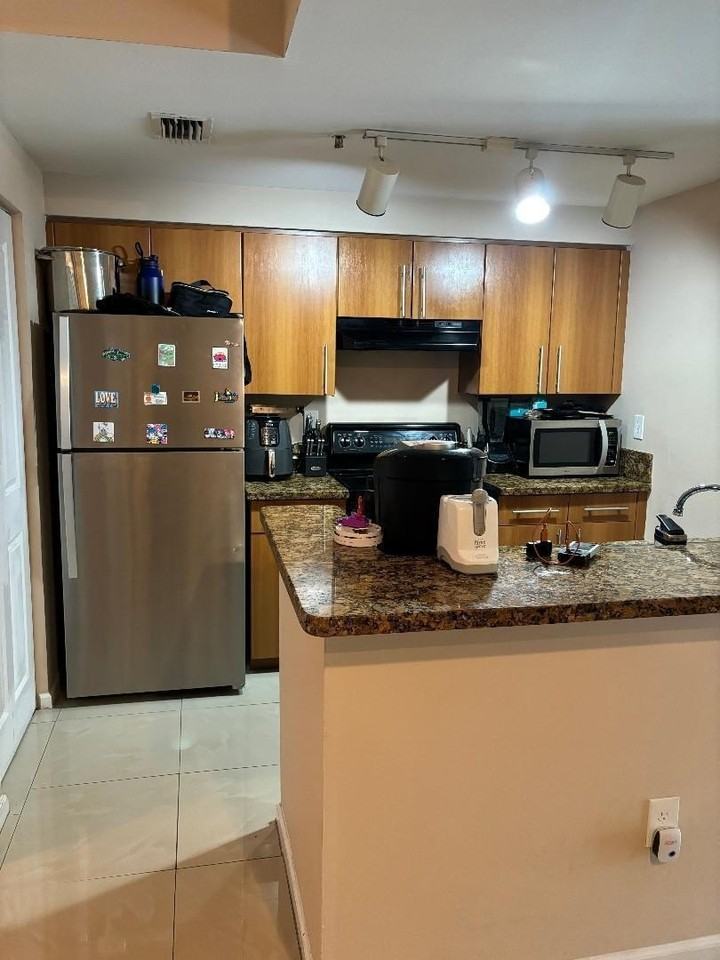 5940 W Sample Rd #307 - Photo 2 of 8