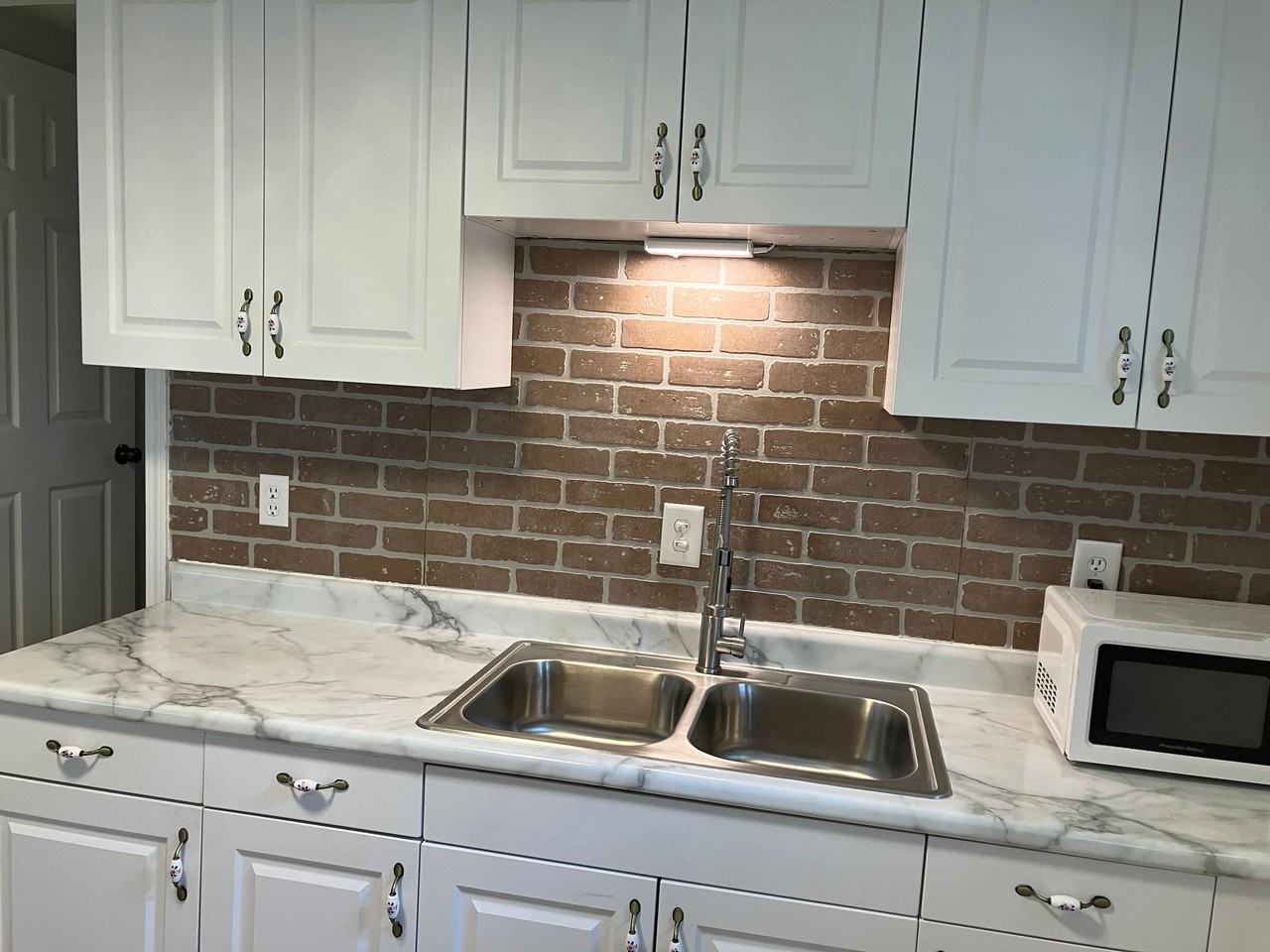 171 W Broadway St - Photo 3 of 3