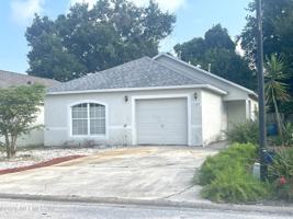 featured image of 7329 Lawn Tennis Ln