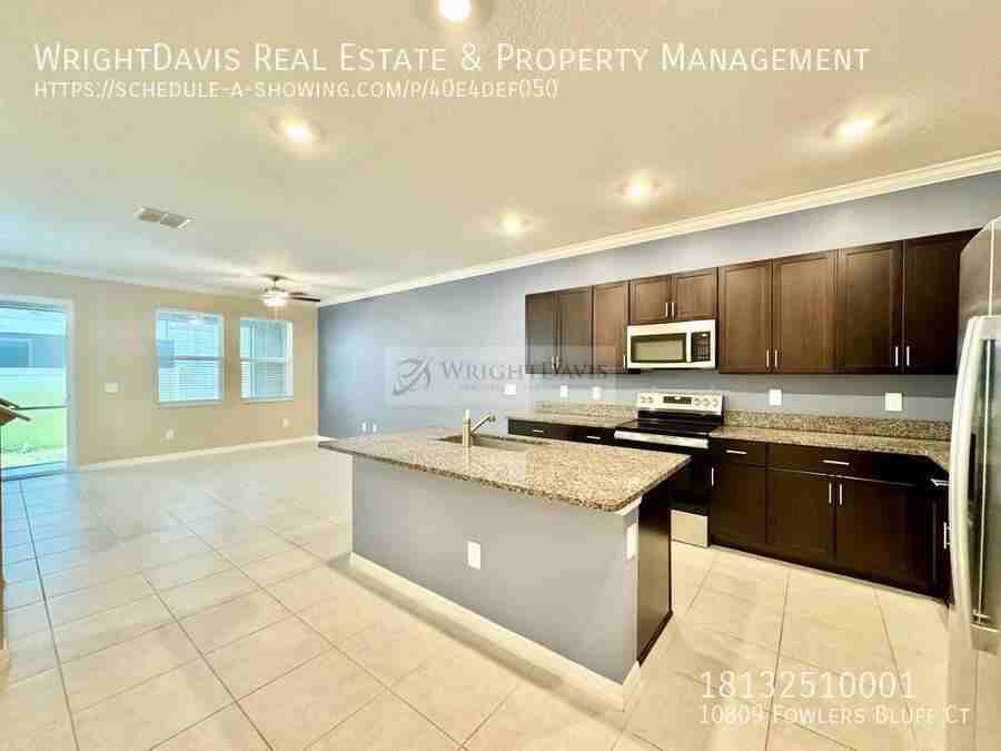 10809 Fowlers Bluff Ct - Photo 4 of 33