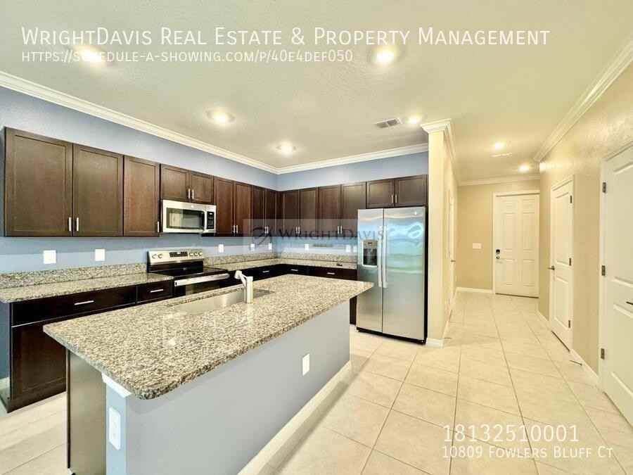 10809 Fowlers Bluff Ct - Photo 5 of 33