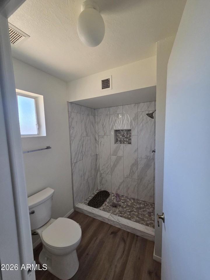 3746 W Surrey Ave - Photo 7 of 14