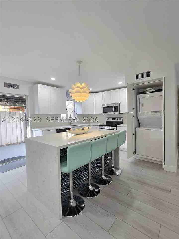 17324 Nw 74th Ave #102 - Photo 3 of 19