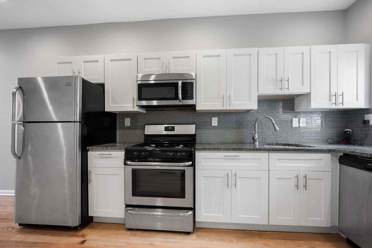 1451 N Dover St #1 - Photo 3 of 20