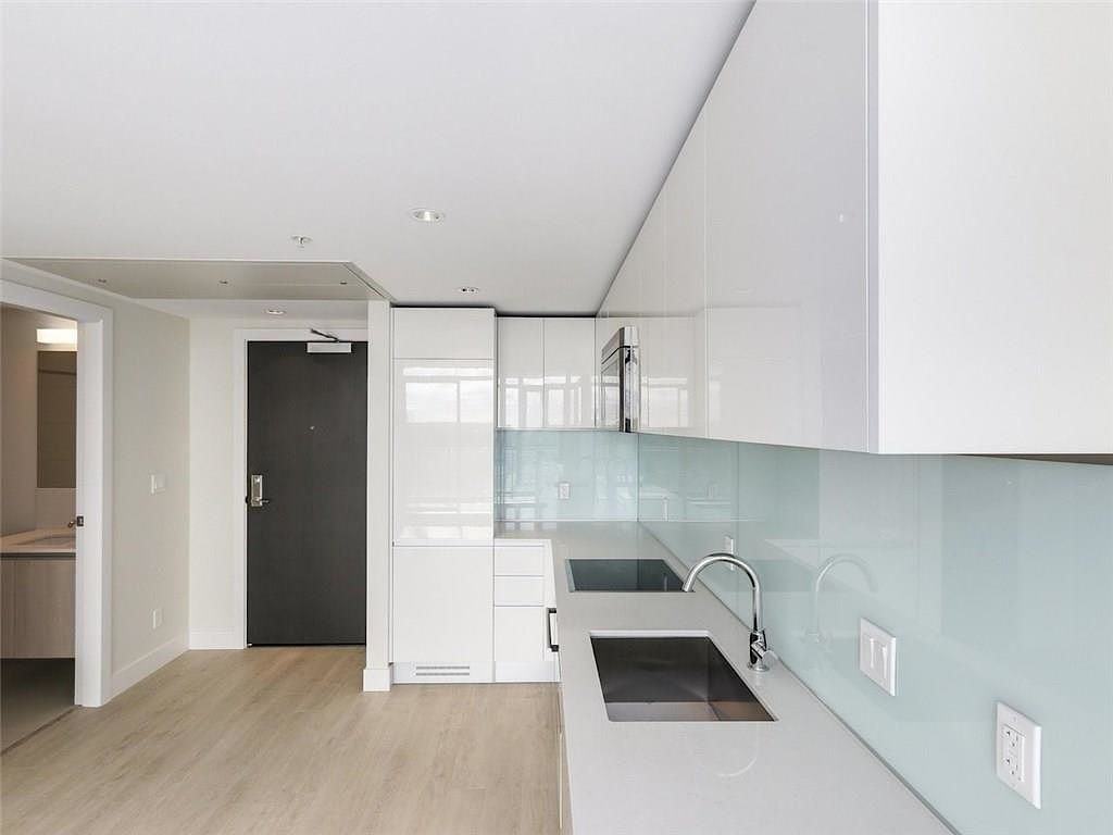 Cozy & Convenient 1 Bed Condo in The Guardian (CIP153) - Photo 2 of 10