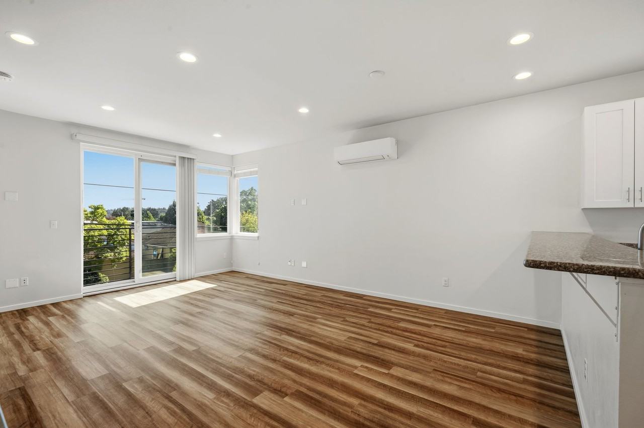 62AVE 62nd Ave Townhomes - Photo 3 of 35