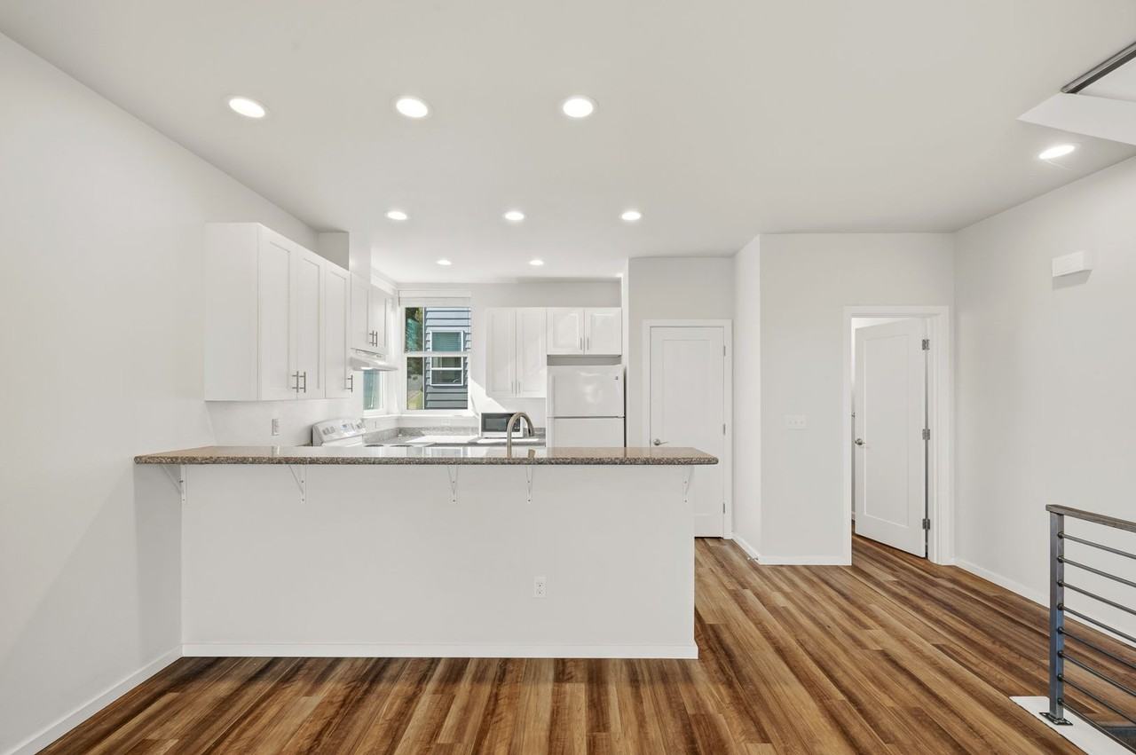 62AVE 62nd Ave Townhomes - Photo 4 of 35