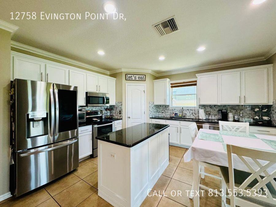 12758 Evington Point Dr - Photo 6 of 31