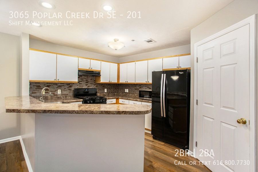 3065 Poplar Creek Dr Se #201 - Photo 4 of 16