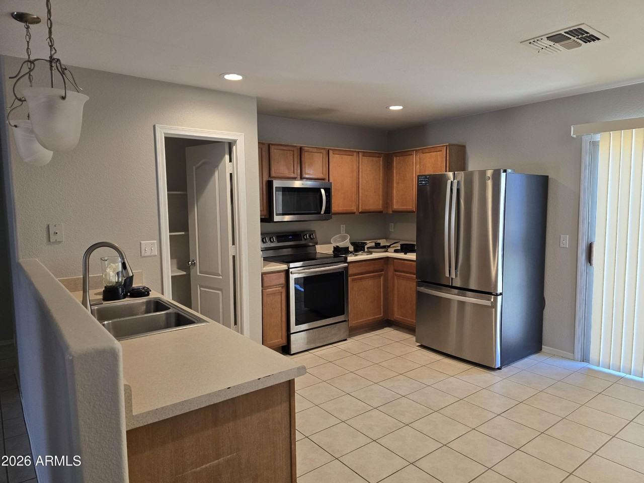 15702 W Watson Ln - Photo 3 of 8