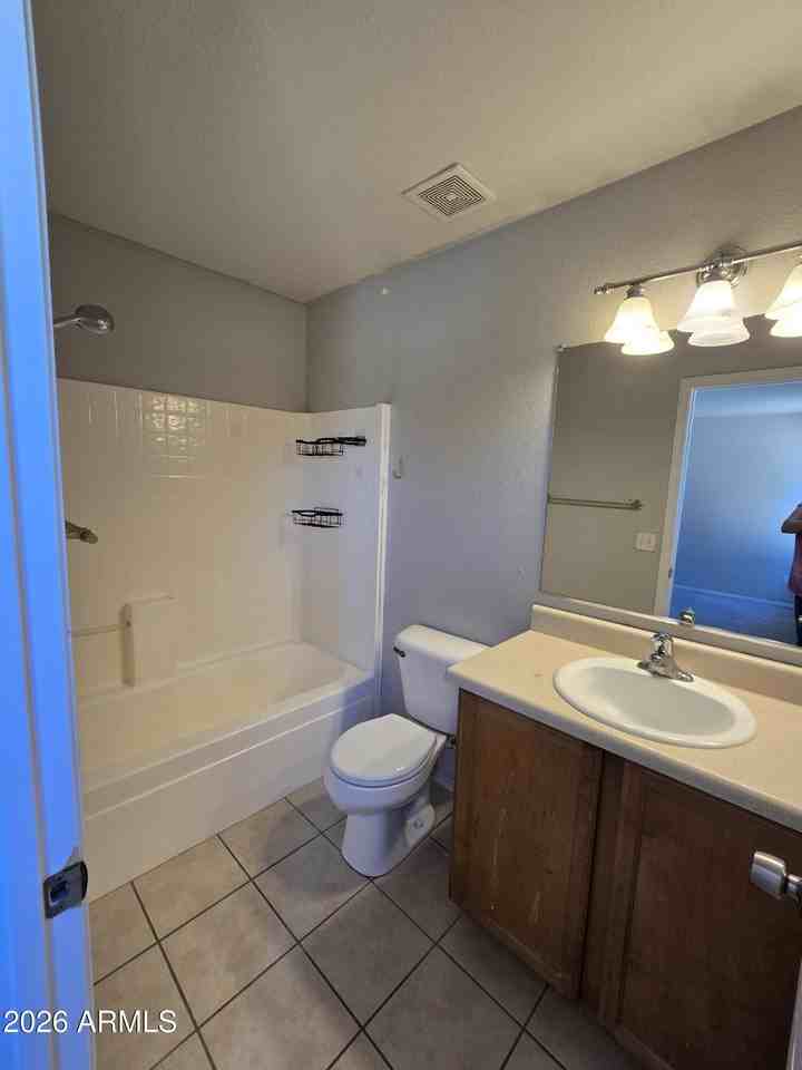 15702 W Watson Ln - Photo 6 of 8