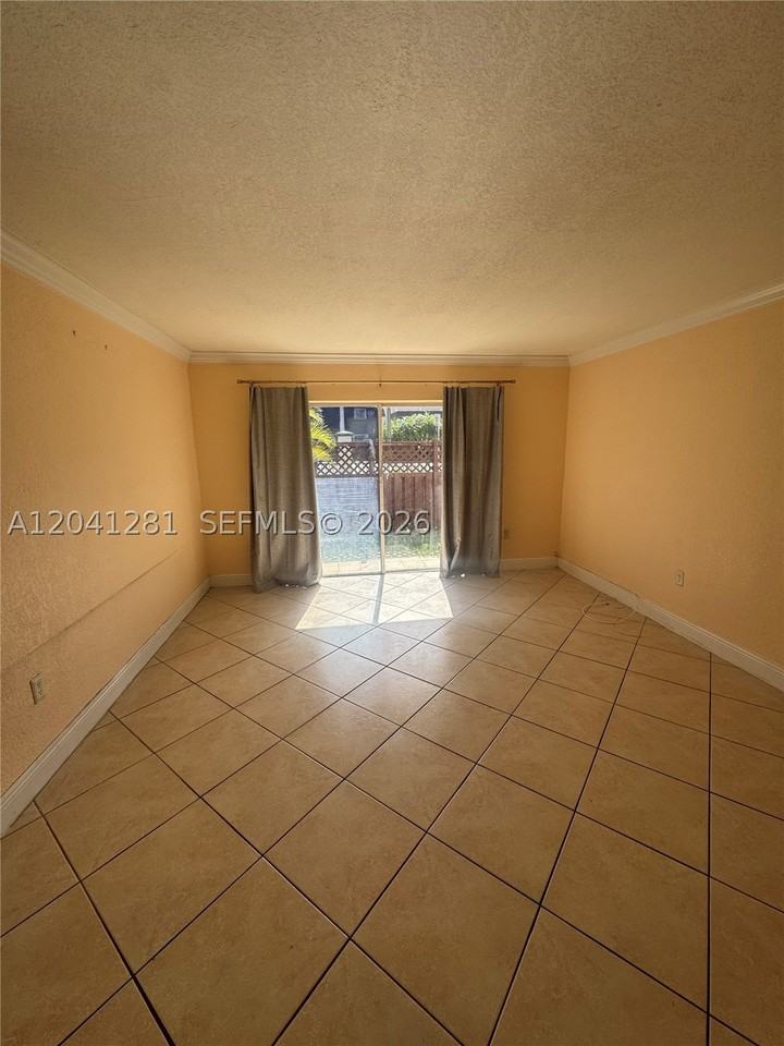 8601 Sw 94th St #103W - Photo 2 of 14