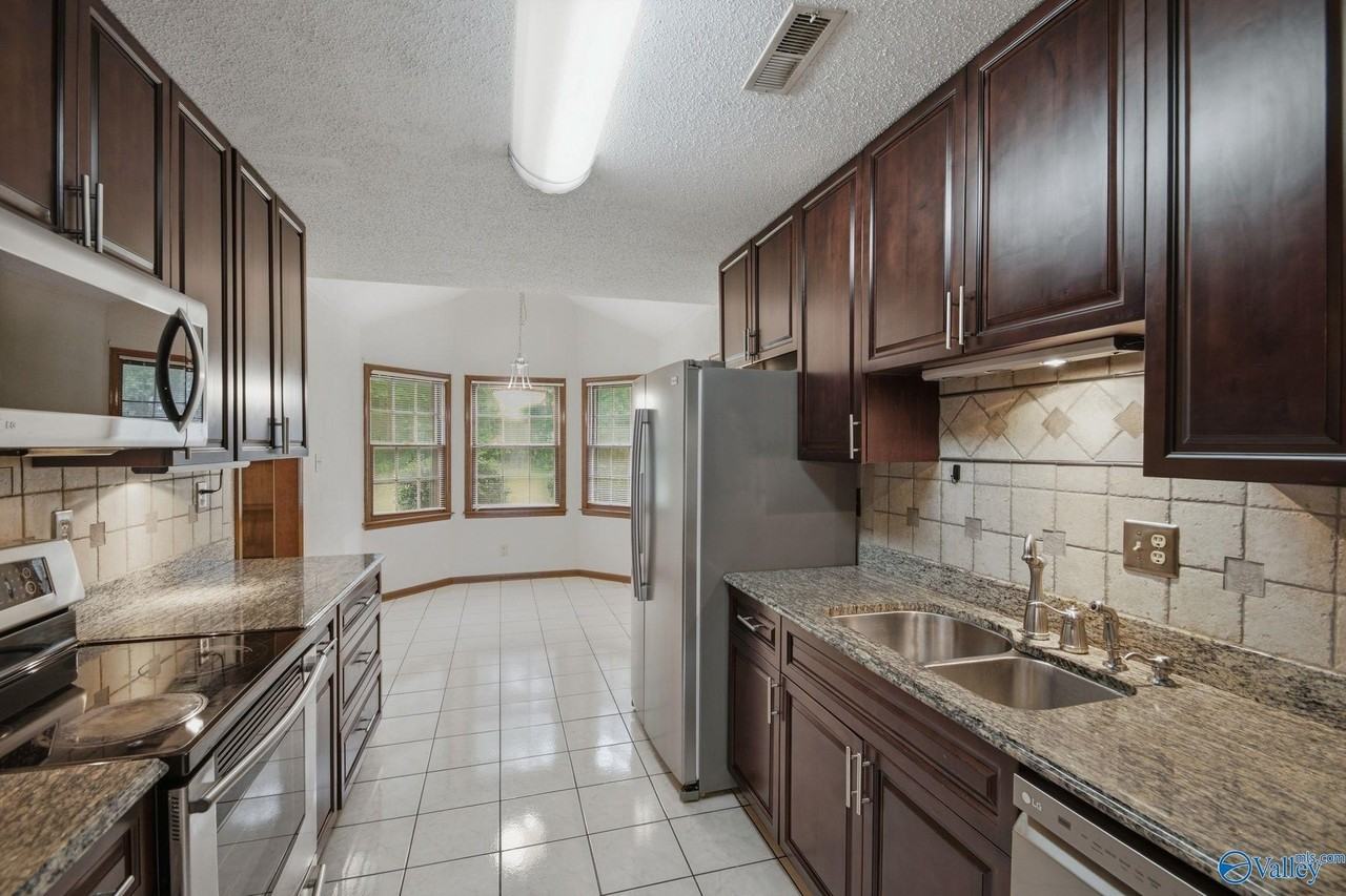 9010 Cannstatt Dr Se - Photo 3 of 36