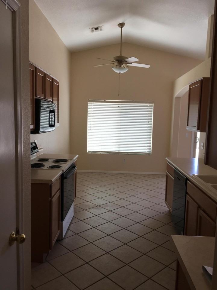 7911 W School Hill Pl - Photo 4 of 15