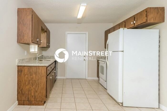8208 Kenwood Rd - Photo 7 of 16