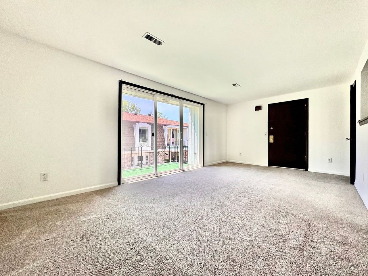 A Modern Space to Live. Convenience to Thrive. - Photo 2 of 12