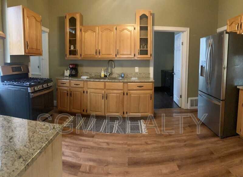 721 S Church St - Photo 4 of 20