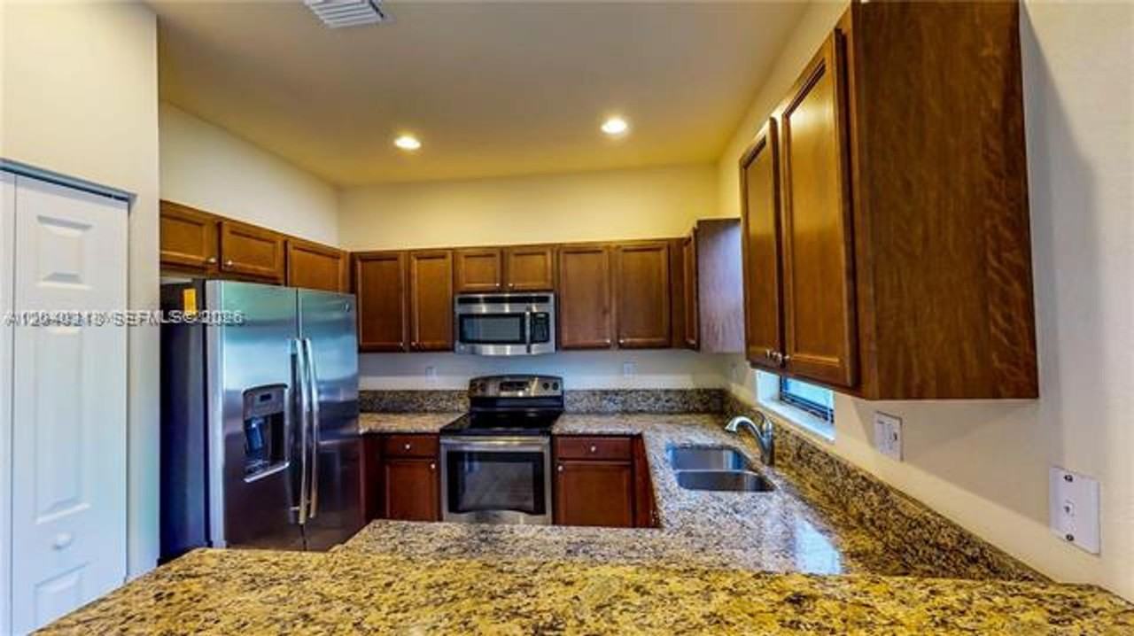 9073 W 33rd Ave - Photo 2 of 50