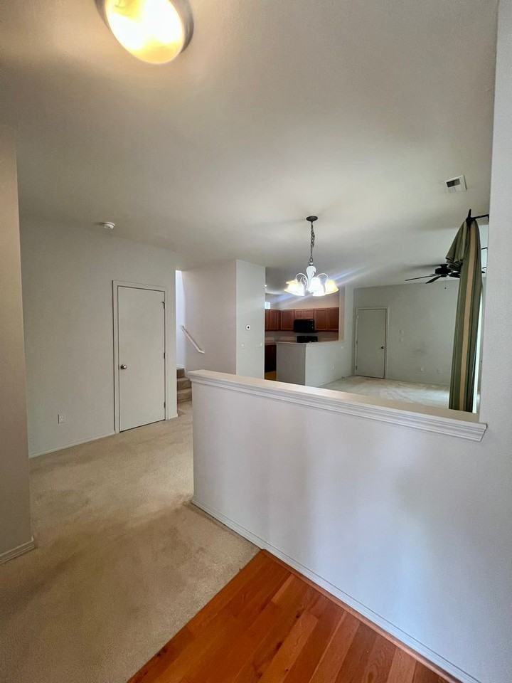 7542 Traditions Ave Ne - Photo 3 of 24