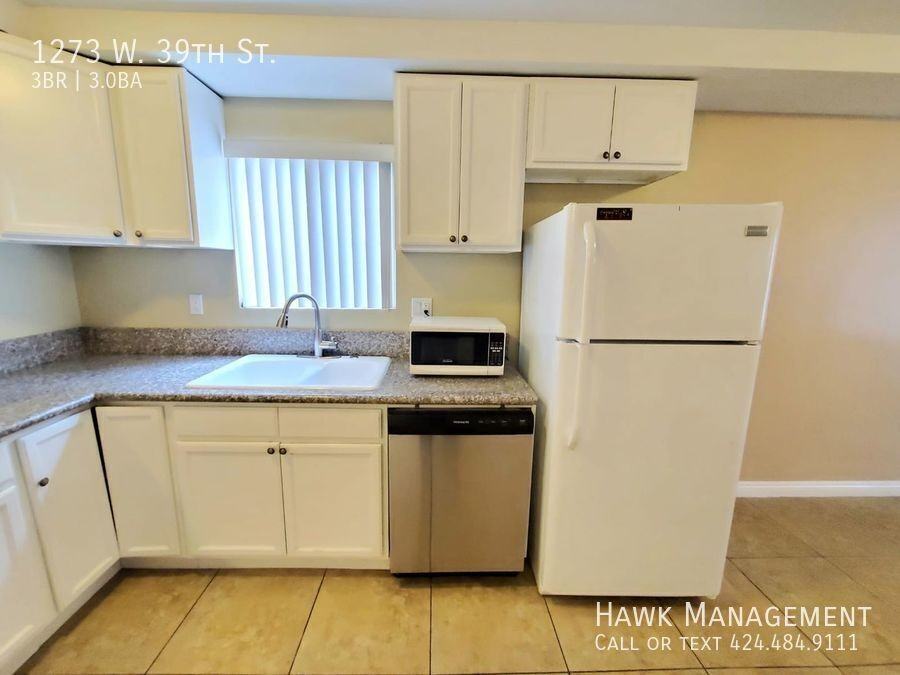 1273 W 39th St - Photo 6 of 16