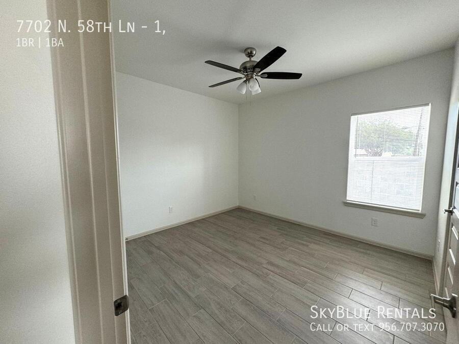 7702 N 58th Ln #1 - Photo 4 of 11