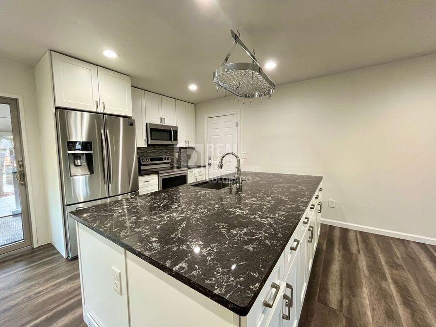 9387 W Eastman Pl - Photo 5 of 23