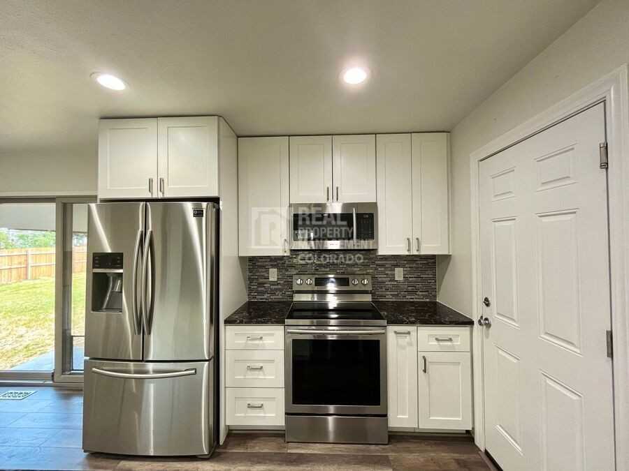 9387 W Eastman Pl - Photo 6 of 23