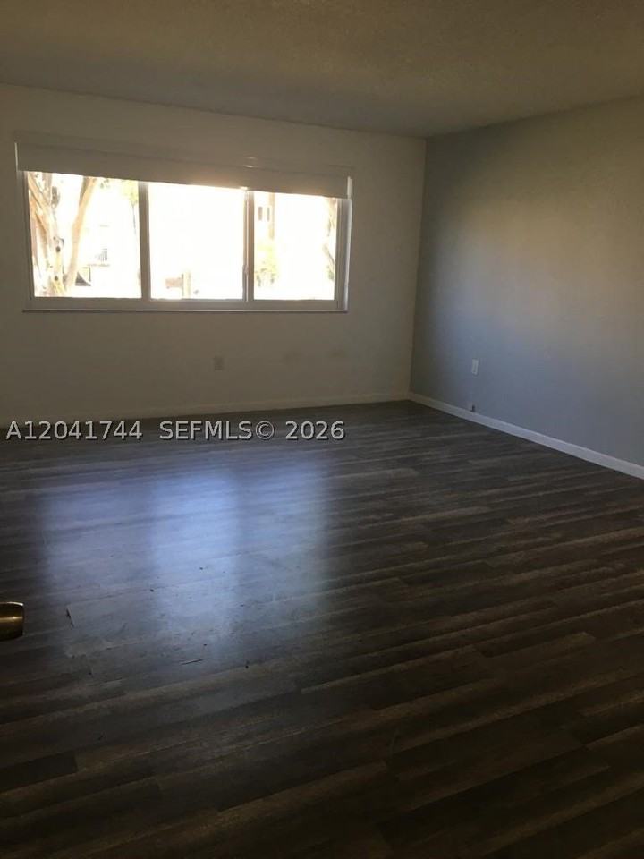 6930 Nw 186th St #1-209 - Photo 2 of 13