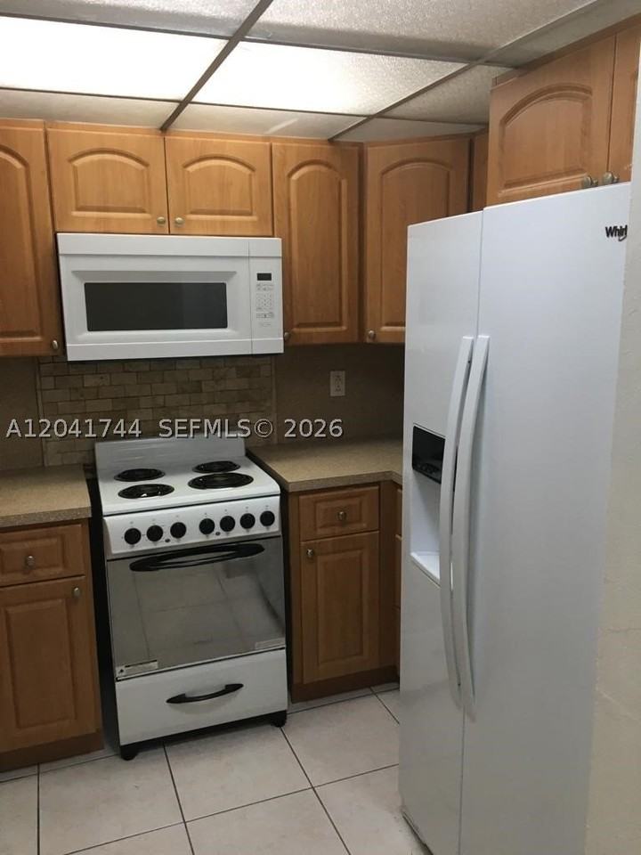 6930 Nw 186th St #1-209 - Photo 6 of 13